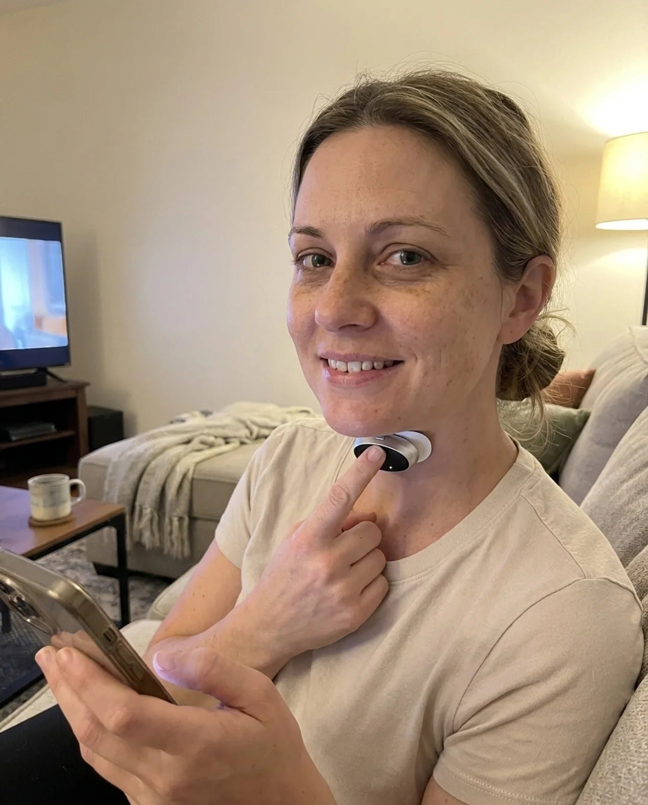 A woman using BreathePulse at home